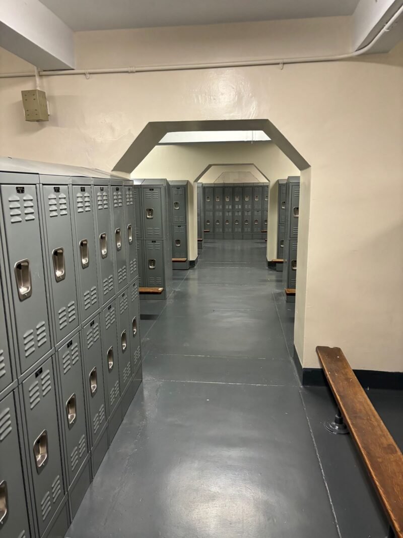 Locker room with new steel lockers under arched openings
